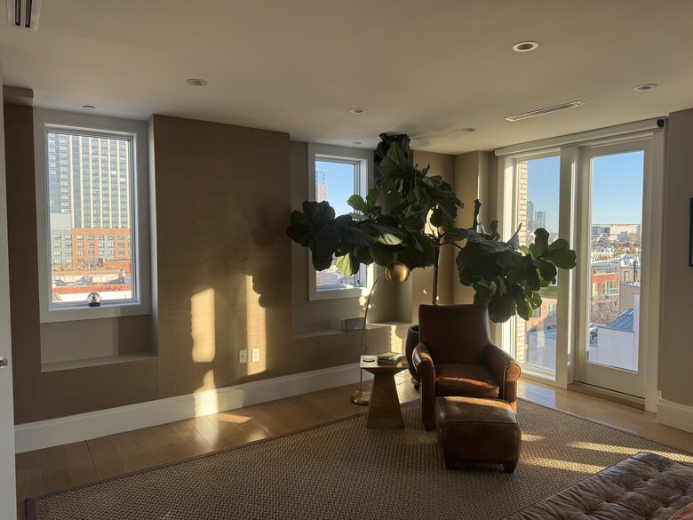 Primary BR on 2nd fl. Floor-ceiling windows facing east, sunrise view