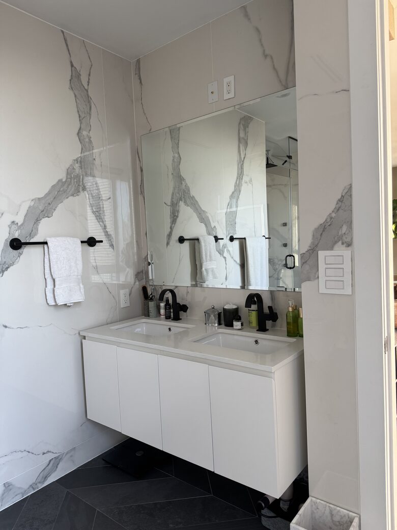 Primary bath 2nd fl. Floor-ceiling windows facing east, sunrise view