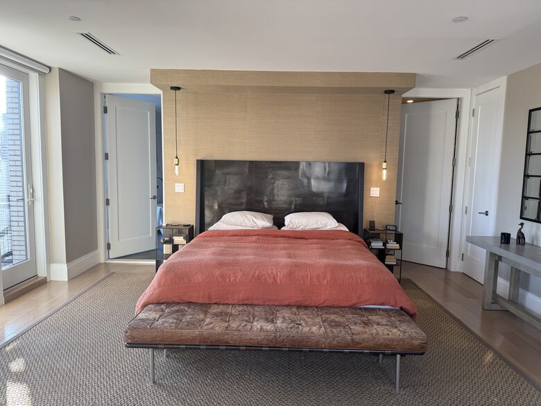 Primary BR on 2nd fl. Floor-ceiling windows facing east, sunrise view