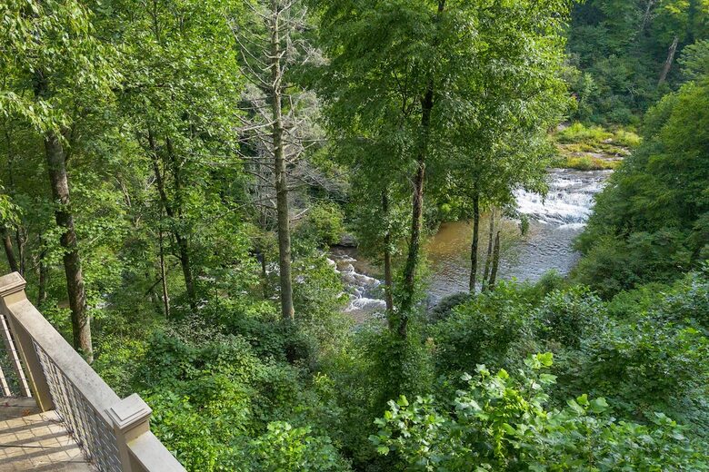 Sapphire Hideaway | Backyard Waterfall located on the Horsepasture River - Sapphire, North Carolina