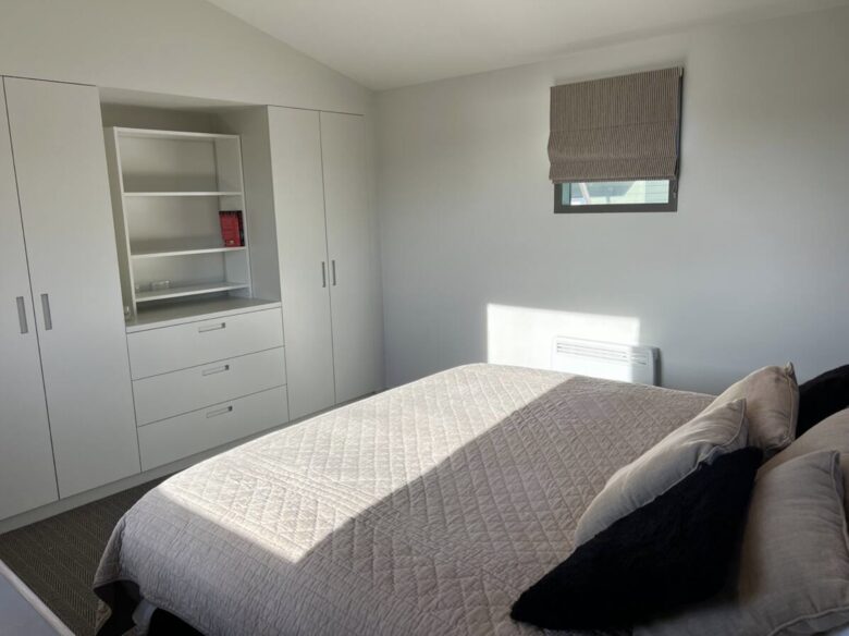 Master bedroom with built-in wardrobes