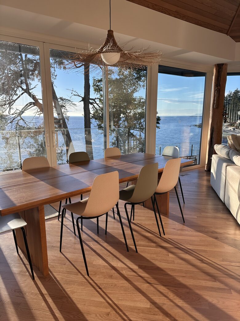 8-10 person dining table with 180 degree views of ocean