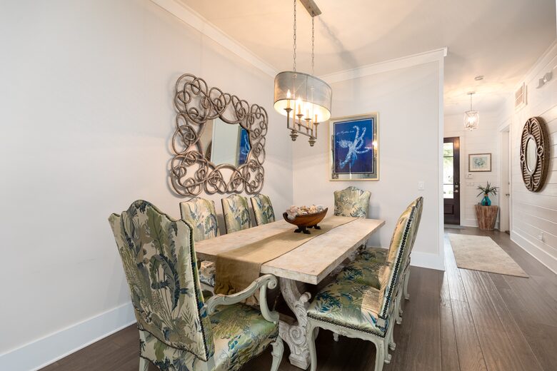 Dining for eight, and bar seating for four. Additional game table.