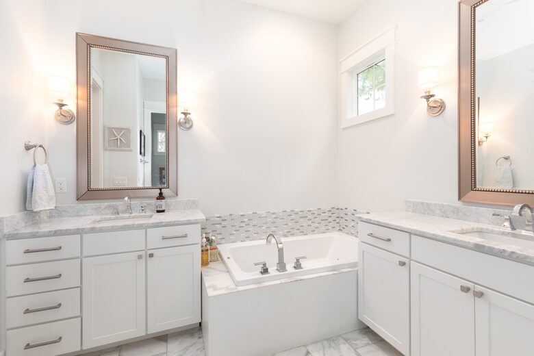 Downstairs primary bath - separate tub