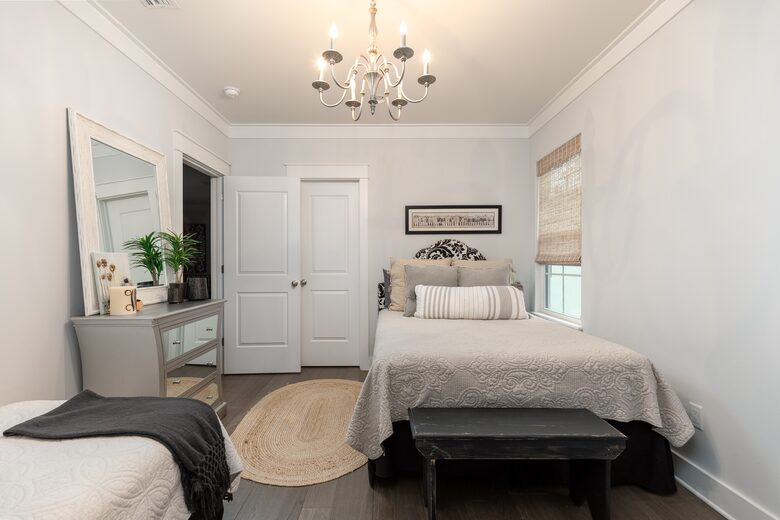 Upstairs center bedroom with queen bed, and twin bed