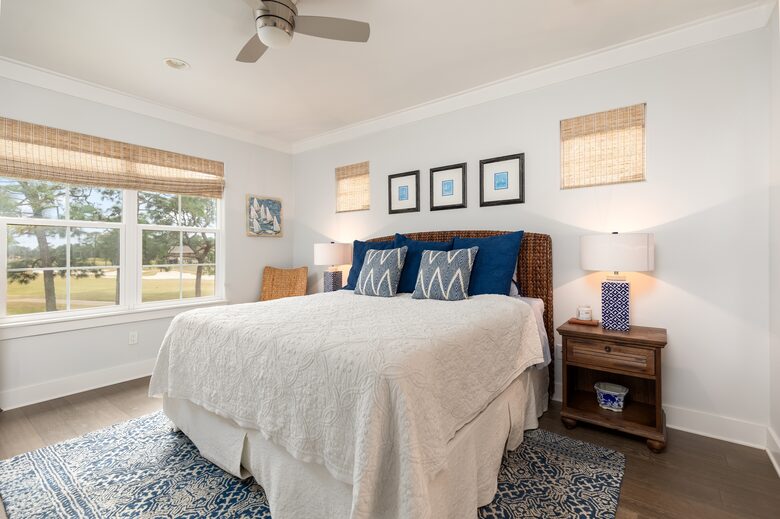 Upstairs primary bedroom with King sized bed