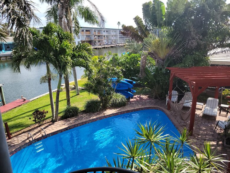 Canalfront Escape with Pool, Kayaks, & Game Room - Cocoa Beach, Florida