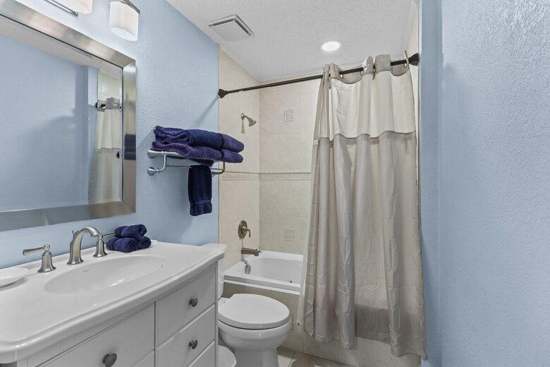 Cozy Coastal Escape with Water Views & Pool Access - Indian Shores, Florida