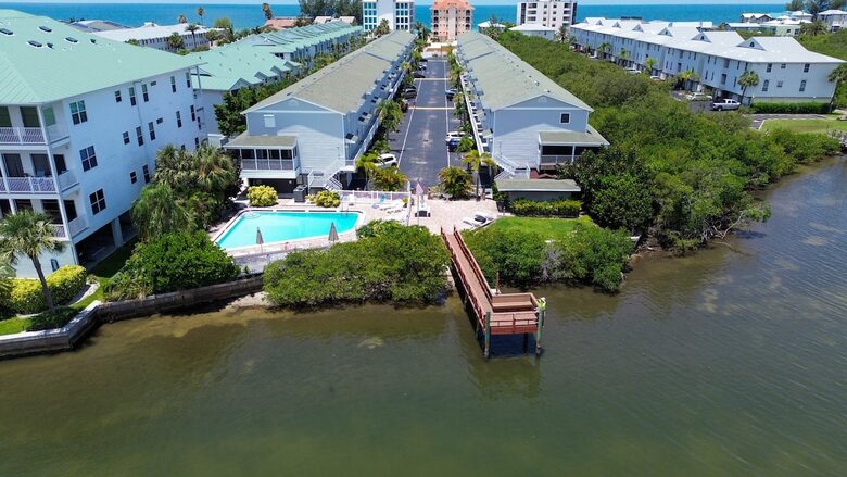 Cozy Coastal Escape with Water Views & Pool Access - Indian Shores, Florida