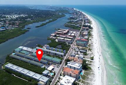Cozy Coastal Escape with Water Views & Pool Access - Indian Shores, Florida