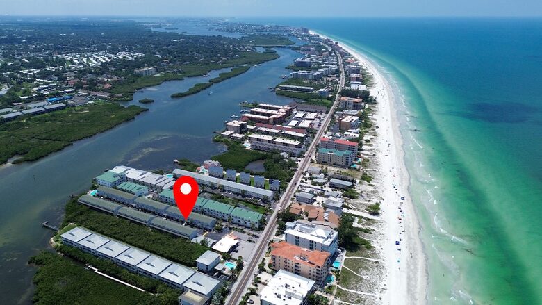 Cozy Coastal Escape with Water Views & Pool Access - Indian Shores, Florida