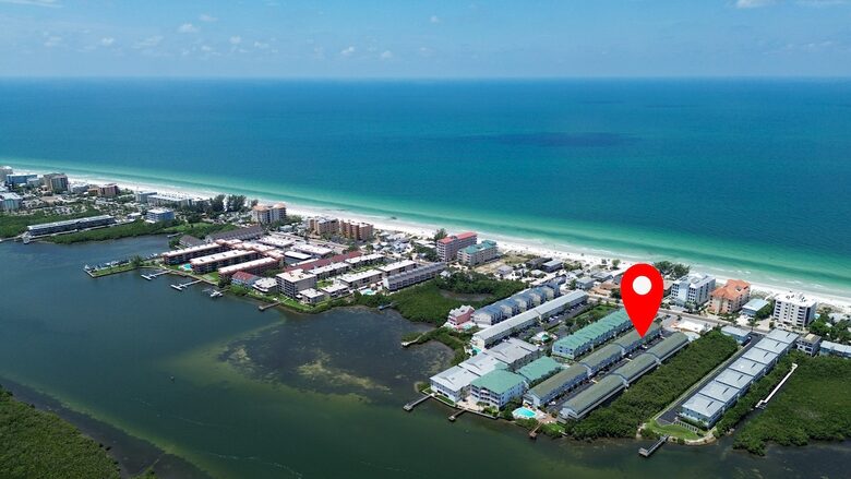 Cozy Coastal Escape with Water Views & Pool Access - Indian Shores, Florida