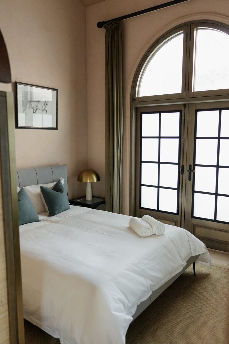 The Villa downstairs queen bedroom