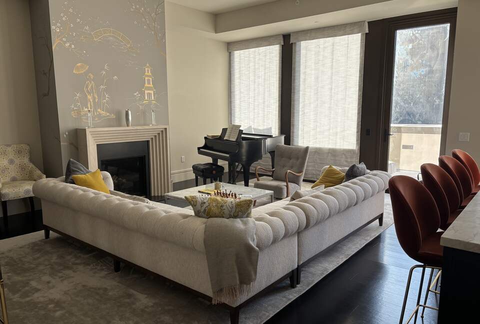 PHA living room with fireplace (door to lower private deck)