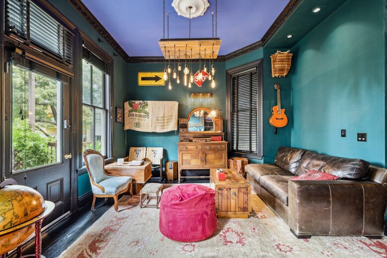 2F Salon: Vintage stadium chairs, antique sideboard, sofa