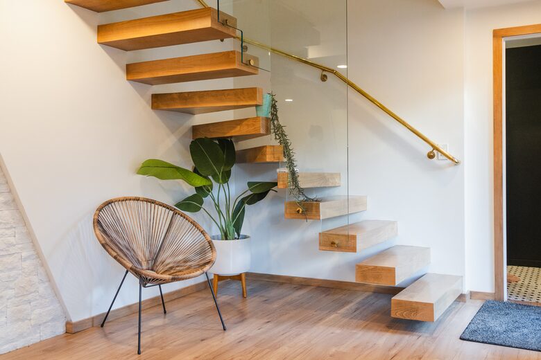 Custom floating stairs take you to 3 additional bedrooms