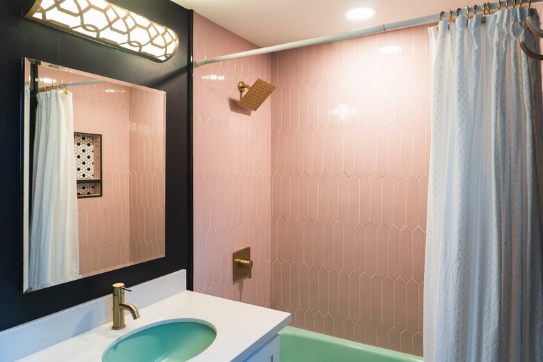 Fun period specific bathroom with original mint fixtures