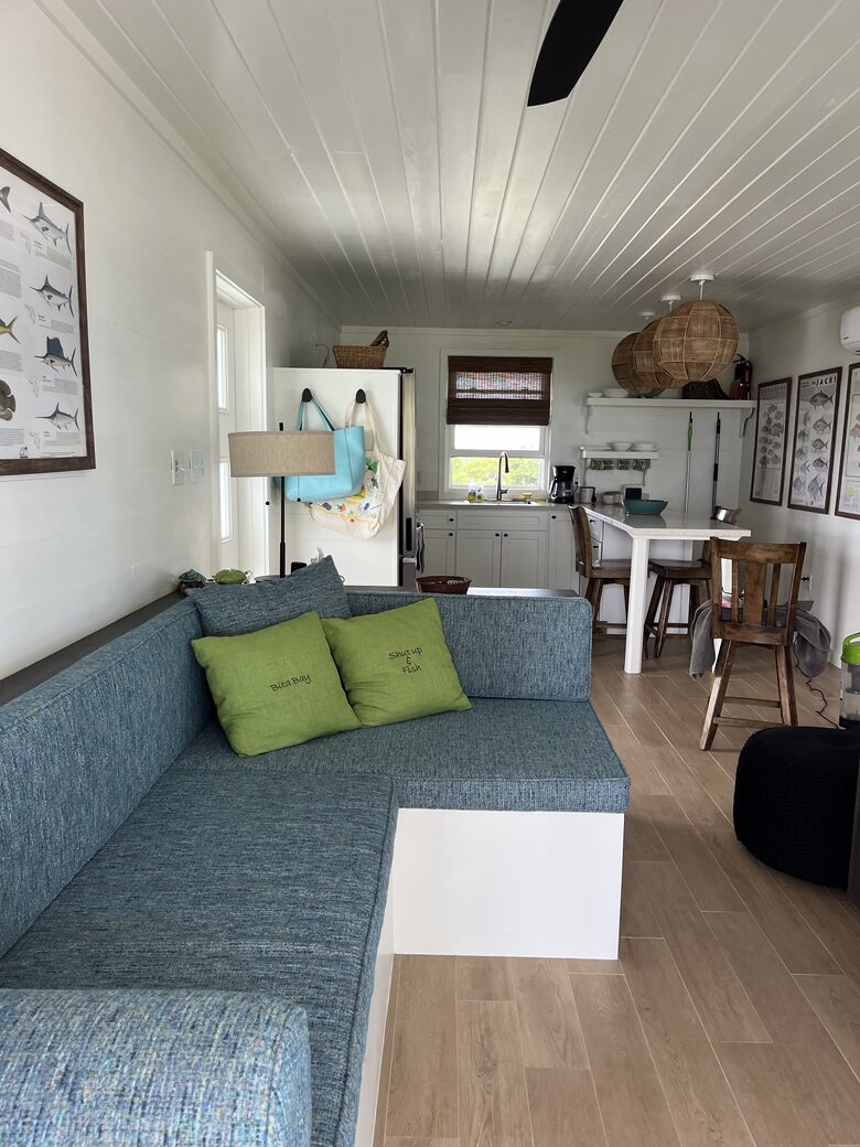 Fully equipped kitchen and outdoor shower with hot water