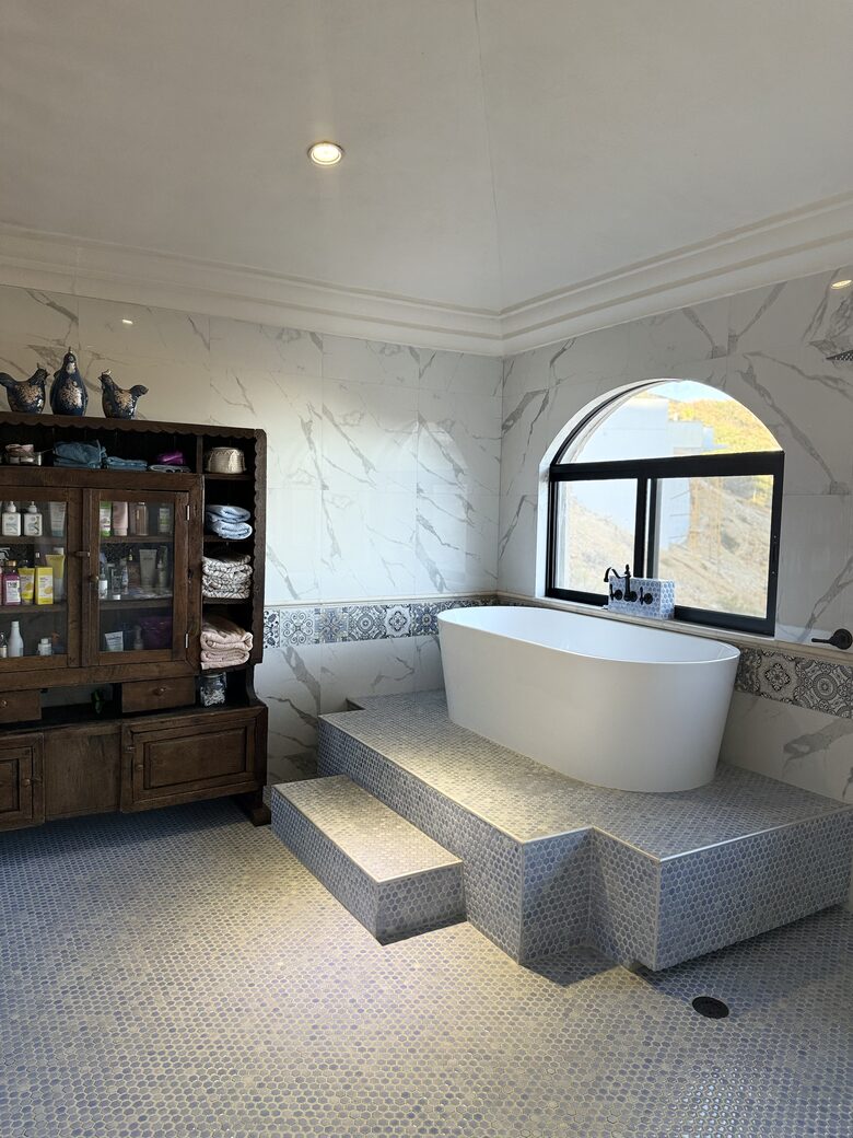 Soaking tub with view of the ocean
