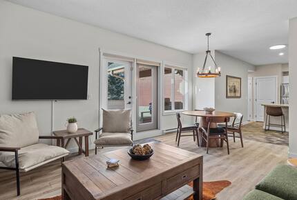 Sunlit Mountain Penthouse with Private Deck & Resort Amenities - Canmore, Canada