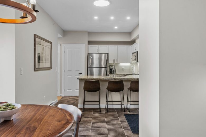 Sunlit Mountain Penthouse with Private Deck & Resort Amenities - Canmore, Canada