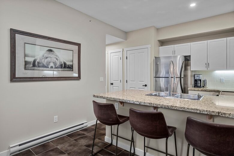 Sunlit Mountain Penthouse with Private Deck & Resort Amenities - Canmore, Canada