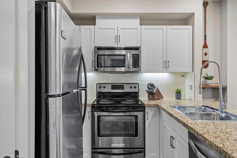 Sunlit Mountain Penthouse with Private Deck & Resort Amenities - Canmore, Canada