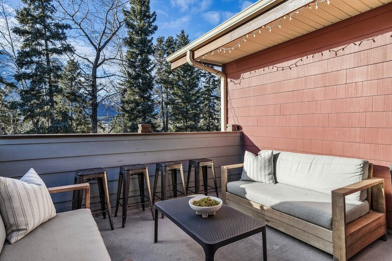 Sunlit Mountain Penthouse with Private Deck & Resort Amenities - Canmore, Canada