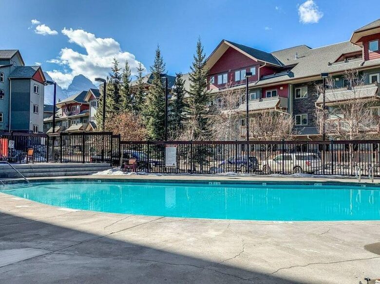Sunlit Mountain Penthouse with Private Deck & Resort Amenities - Canmore, Canada