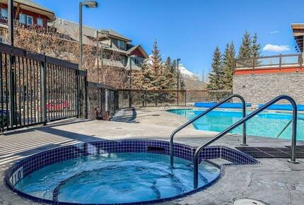 Sunlit Mountain Penthouse with Private Deck & Resort Amenities - Canmore, Canada
