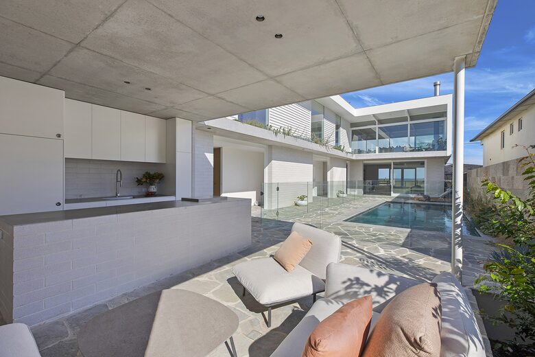 Beachfront Elegance with Panoramic Coastal Views & Private Mineral Pool - Copacabana, Australia