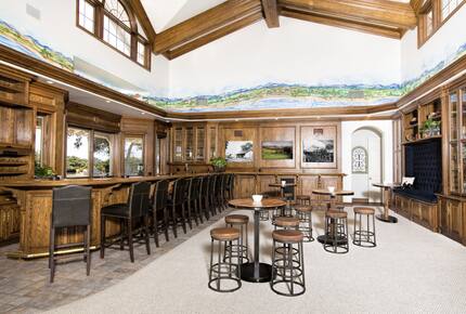 Living room with bar and bar seating