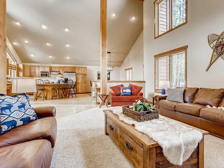 Living room with two couches and love seat