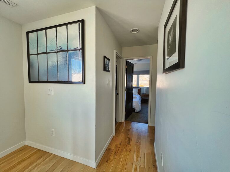 2nd floor hall leading to the 2 guest bedrooms