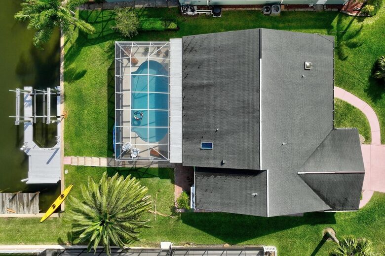 Stylish Waterfront Getaway with Pool, Spa & Boat lift and Dock in Palm Coast Florida - Palm Coast, Florida