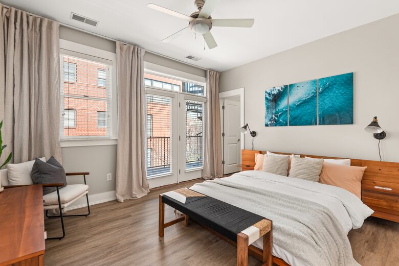 Bedroom One with a balcony and roof access