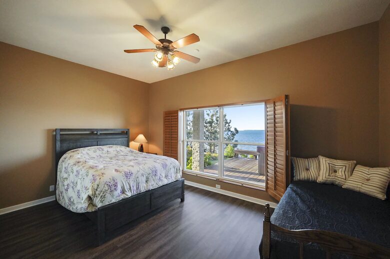 Third bedroom with King bed, trundle bed and lake views