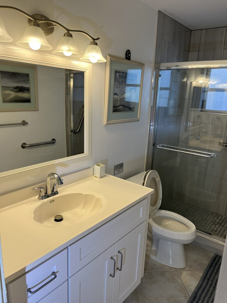 New bathroom shower and cabinet.
