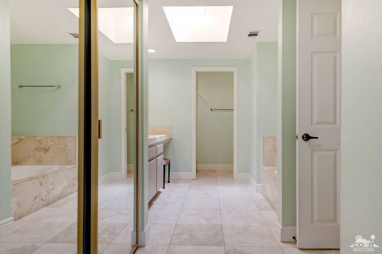 Master bath with large separate soaking tub