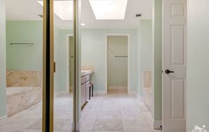 Master bath with large separate soaking tub
