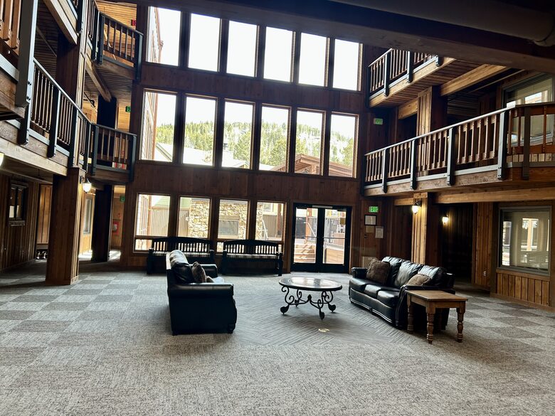 Common space with access to patio and hot tub
