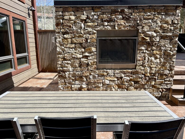 Outdoor “see through” fireplace with ample seating