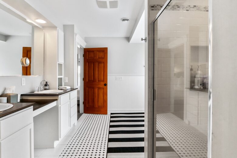 Second floor Master double vanity sinks, toilet and shower