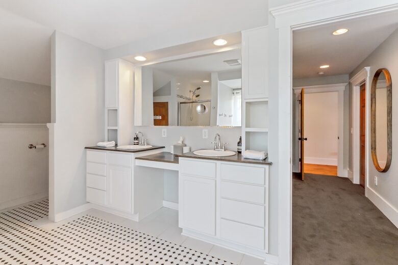 Second floor Master double vanity sinks, toilet and shower
