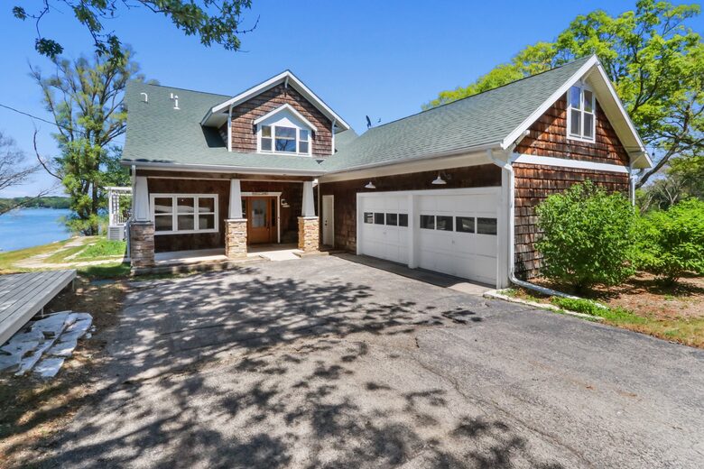 Driveway view of house