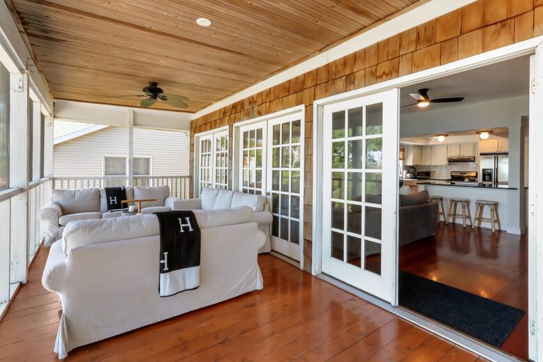 Amazing view of the lake with screened in porch