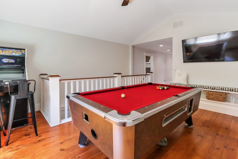 Game room with pool table, Golden Tee, Darts and Smart TV