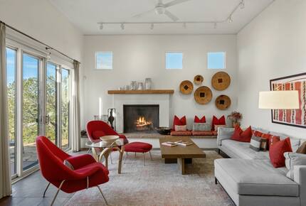 Spacious living room with sunset views and fireplace
