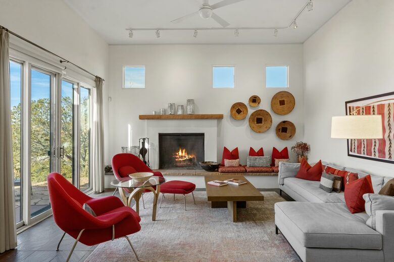 Spacious living room with sunset views and fireplace
