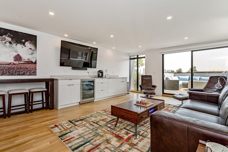 Top floor wet bar with refrigerator for beverages and coffee bar